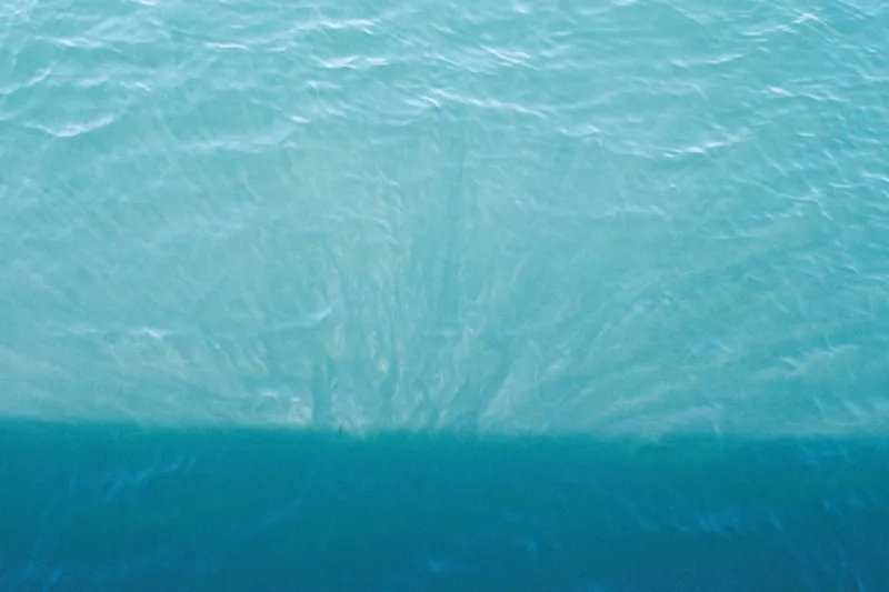 a body of water with waves